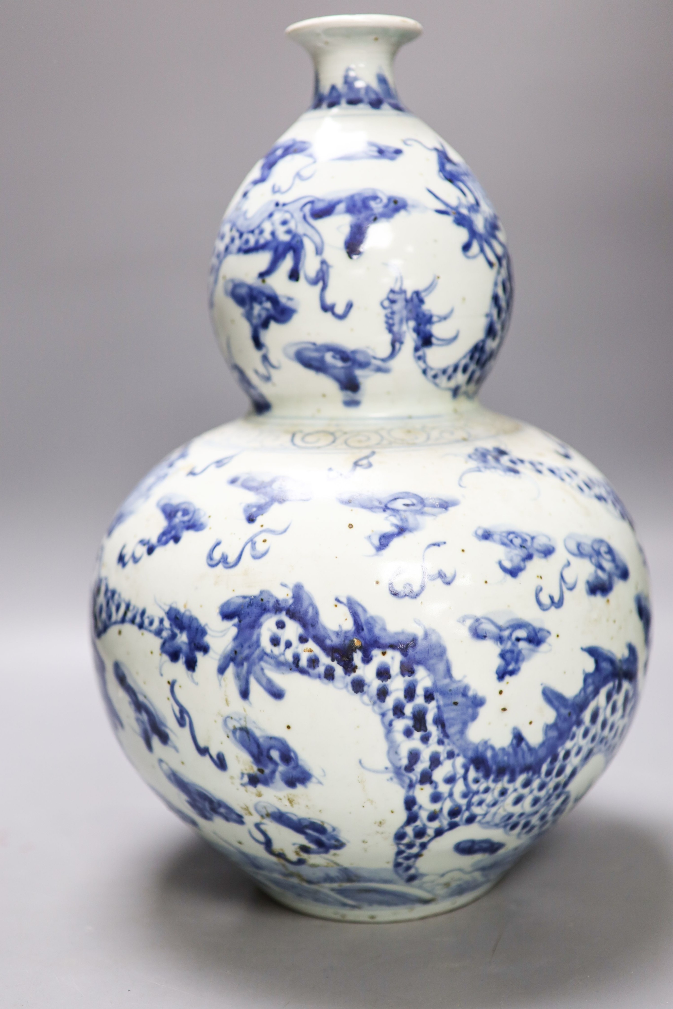 An impressive Chinese blue and white double gourd ‘dragon’ vase 37cm